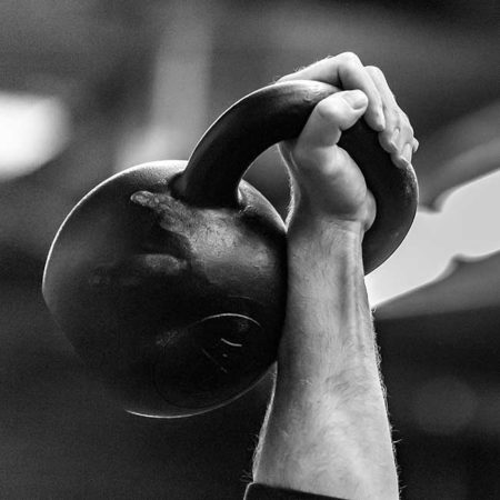The One-Arm Barbell Press -  %