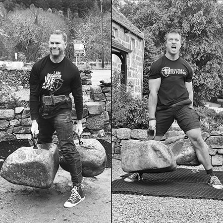 Jason Marshall and Sven Rieger lifting the Dinnie Stones